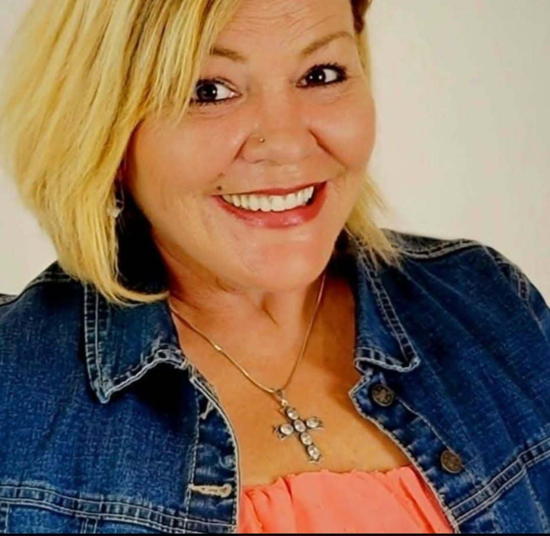 Lori Borussard, a Lingraphica AAC device user.