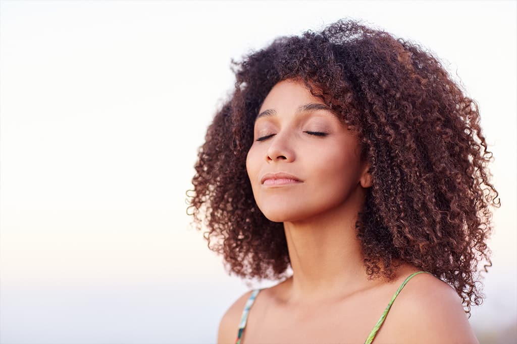 Serene woman breathing