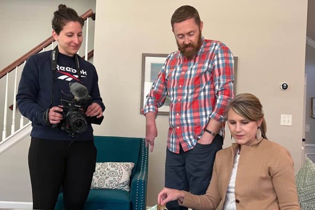 director amy russo on set with camera and interview subjects