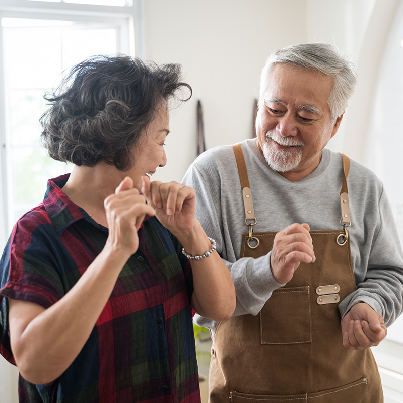 Photo of a happy couple dancing together