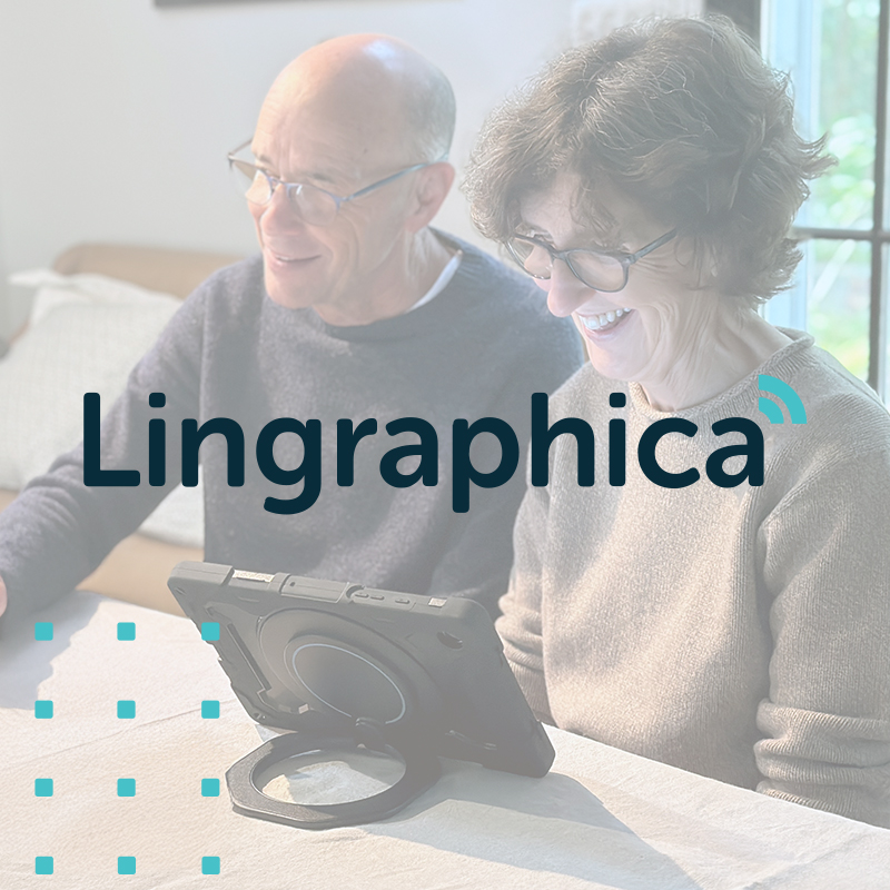 Photo of couple using a Lingraphica TouchTalk AAC device overlayed with the company's new logo.